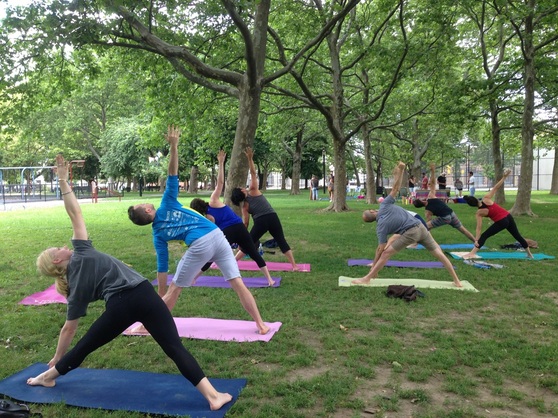 Trikonasana Triangle pose Yoga in the Park Brooklyn NY Cooper Vicyasa